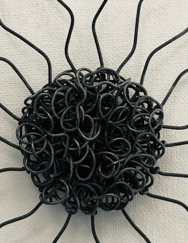 Attrape soleil, soleil en fil de fer