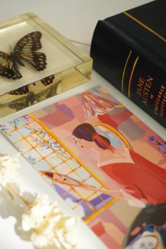 Carte postale la brodeuse