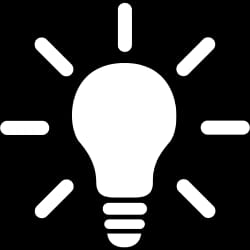 Icône d'une ampoule blanche avec des éclats lumineux autour, symbolisant l'idée ou l'innovation.