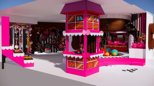 Intérieur coloré et ludique avec une structure centrale rose vif ressemblant à un stand, une femme utilisant un téléphone, des décorations géométriques et des coussins colorés dans un espace spacieux et lumineux.