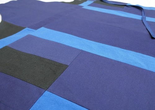 Vêtements professionnels réalisés à la commande à partir de textiles éco-responsable. Fabriqué en Bretagne.