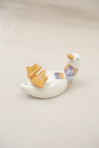 Canard sur le dos écharpe