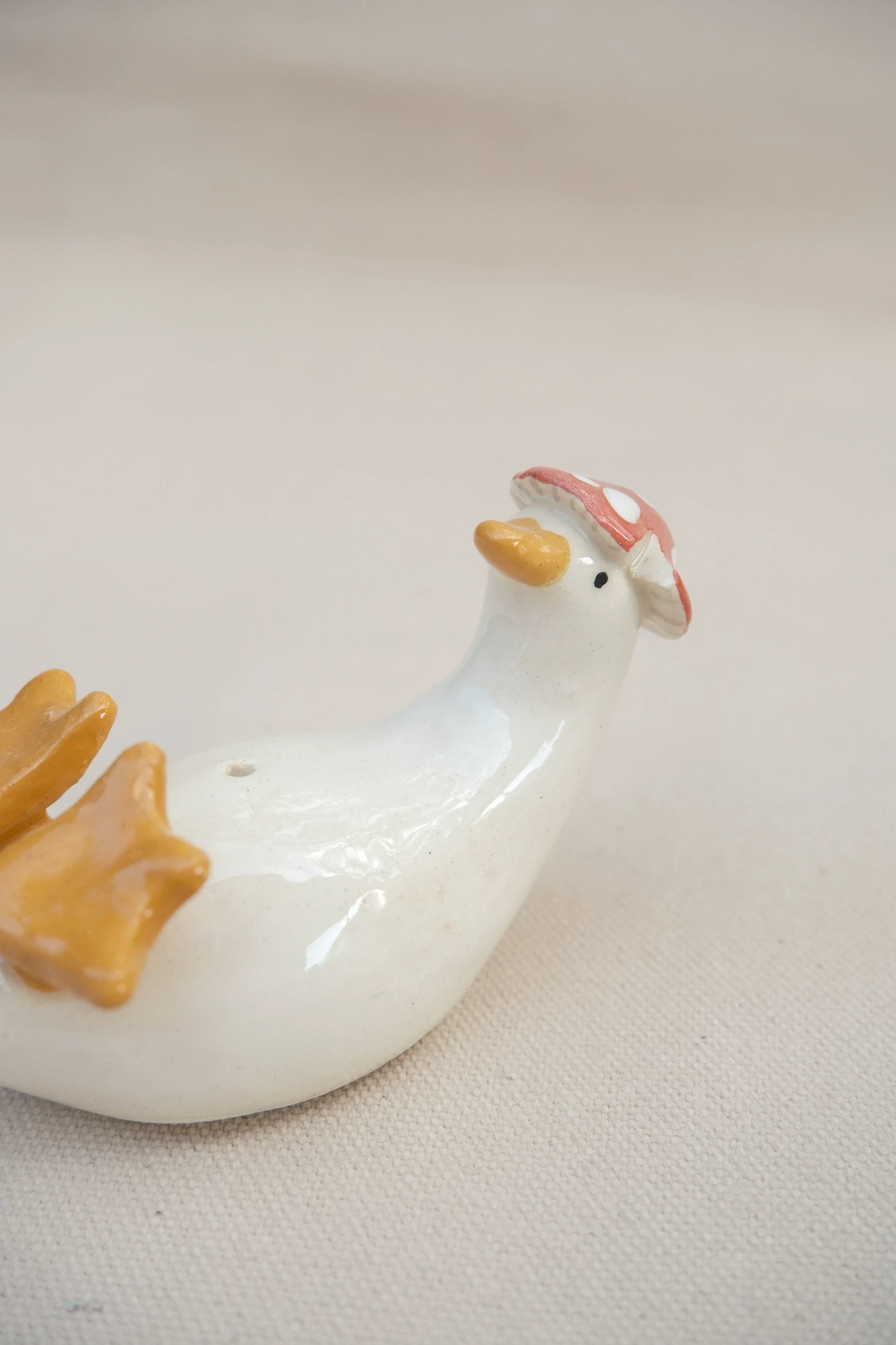 Soliflore canard amanite sur le dos