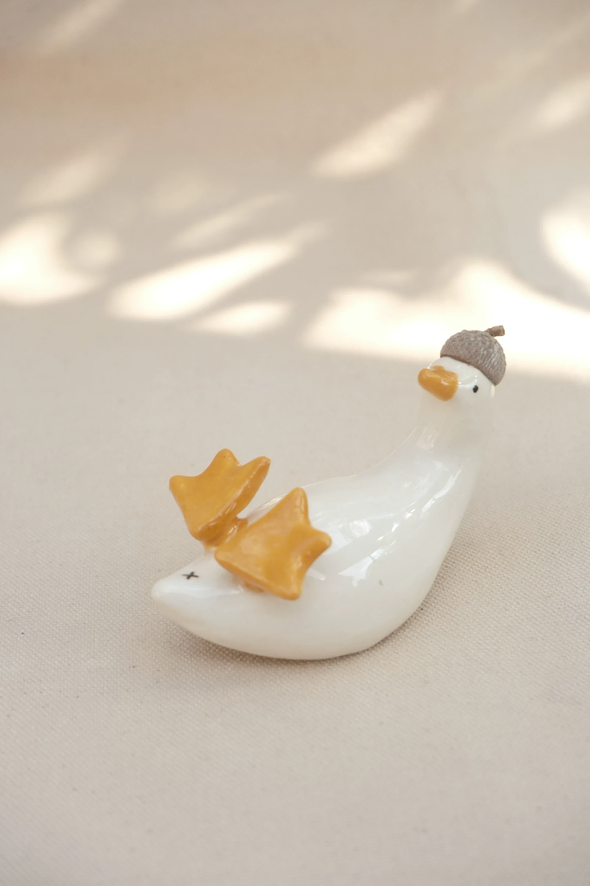 Canard sur le dos chapeau gland