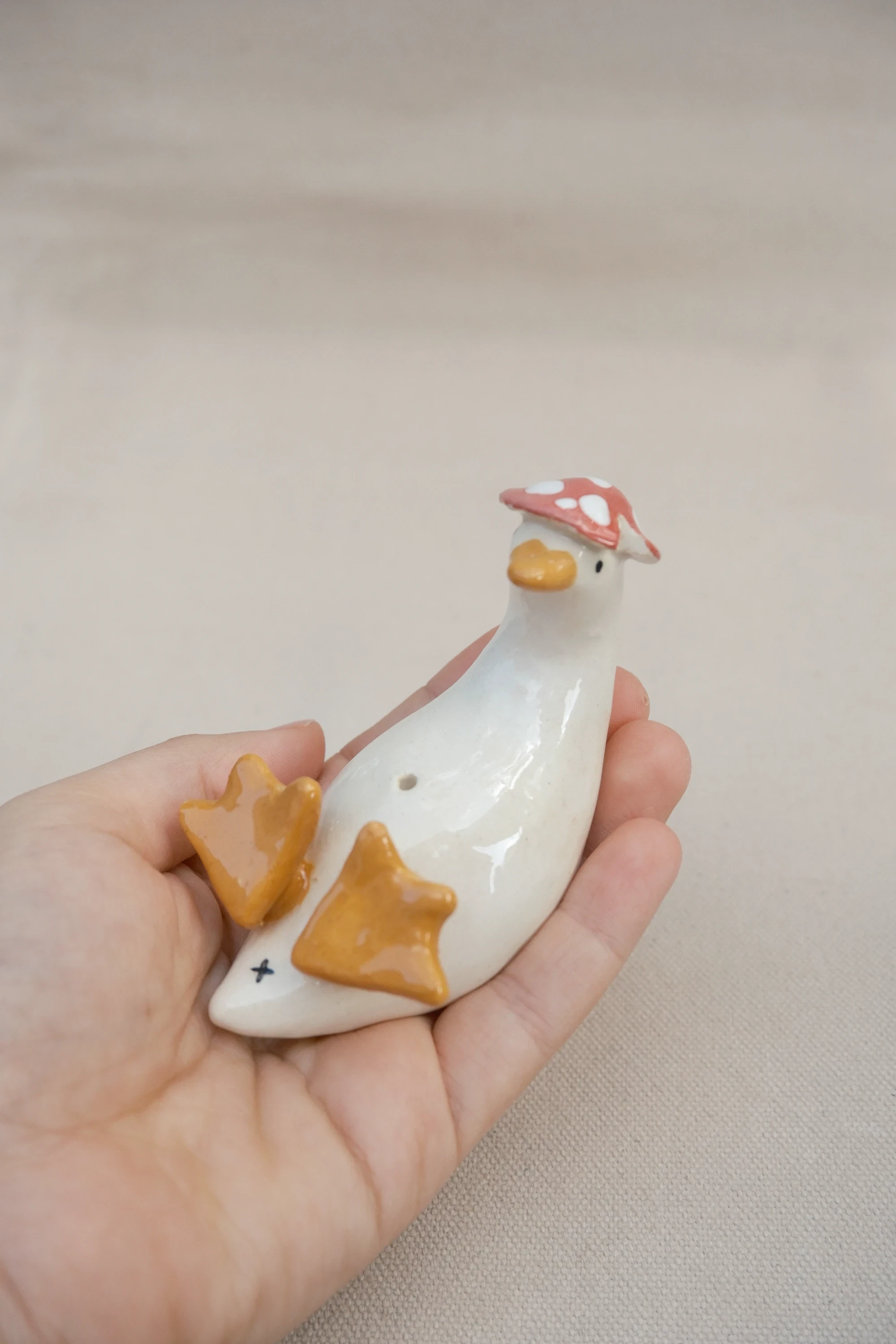 Soliflore canard amanite sur le dos