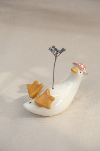 Soliflore canard amanite sur le dos