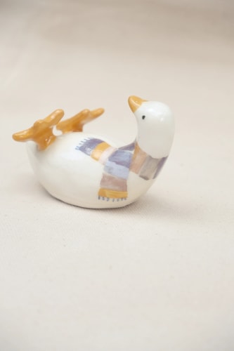 Canard sur le dos écharpe