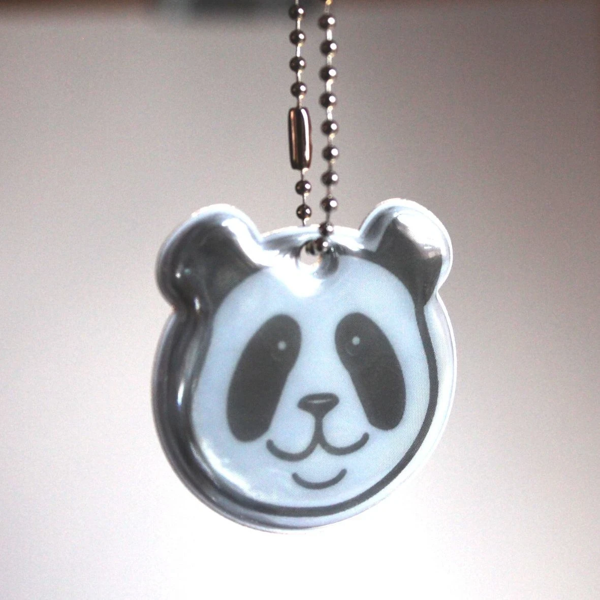 Joli réflecteur panda avec une chaîne en métal