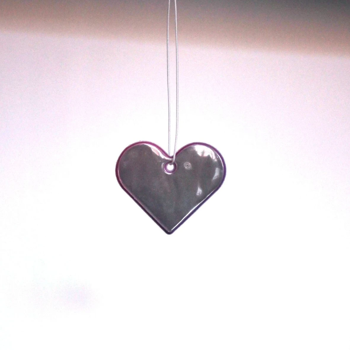 Réflecteur coeur avec ficelle