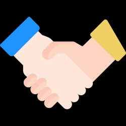 Deux mains se serrent pour symboliser une poignée de main, pour la confiance et l'engagement